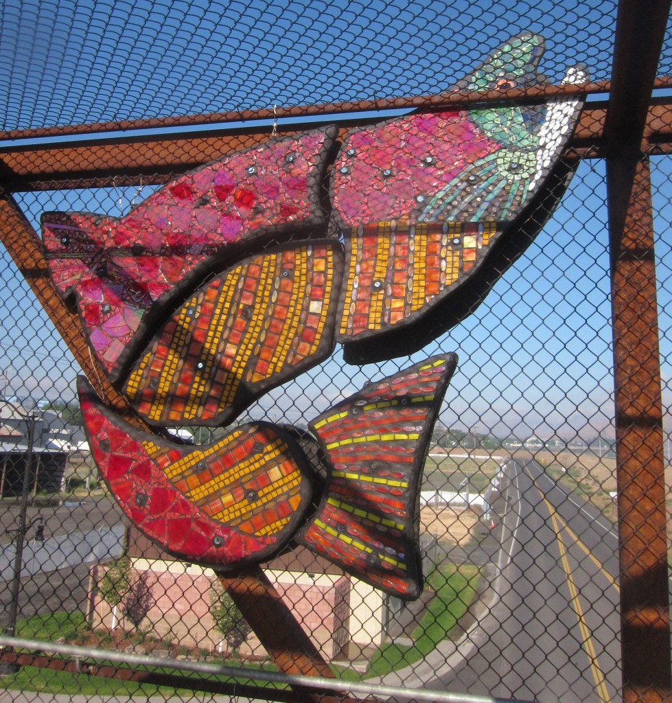 2014 Juror’s Choice: Giulio Menossi. Melissa Cole, Confluence (of the Snake and Clearwater Rivers), 2013, Concrete, stained, fused glass, recycled glass tile, and epoxy grout, concrete and Wedi board. Installation Location: Lewiston, ID