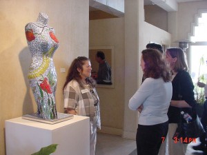 Artist with "Eve". mannequin, stained glass